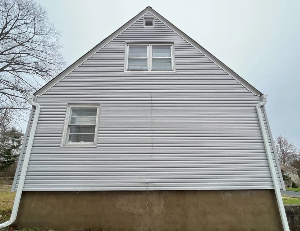 Middleburg Heights Power Washing technician performing detailed house washing in Middleburg Heights residential area